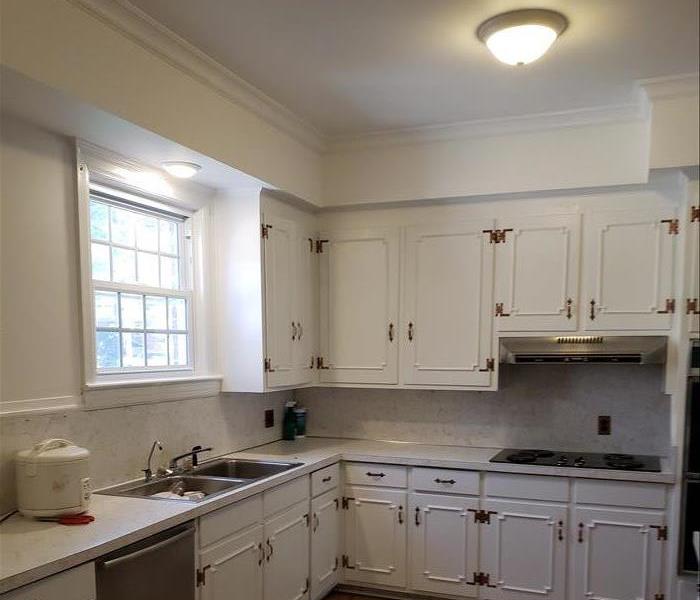 kitchen with repaired ceiling and fresh paint