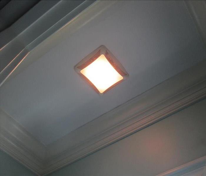 same bathroom ceiling has been cleaned and painted
