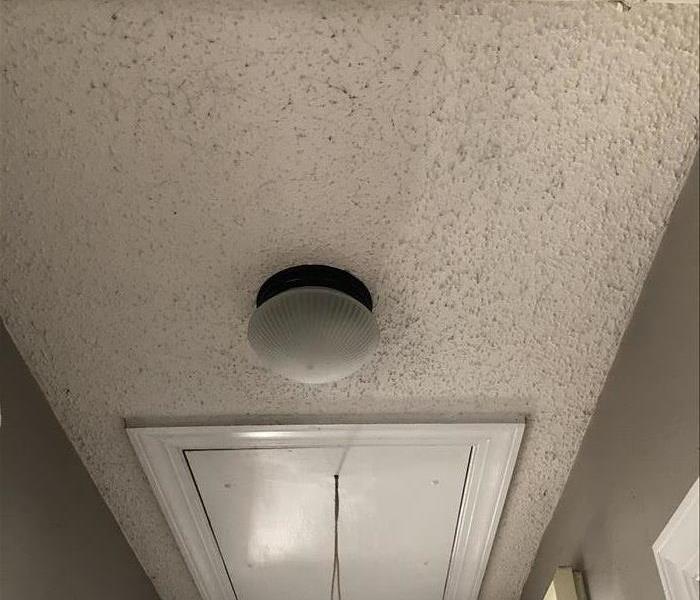 hallway ceiling showing smoke damage/soot