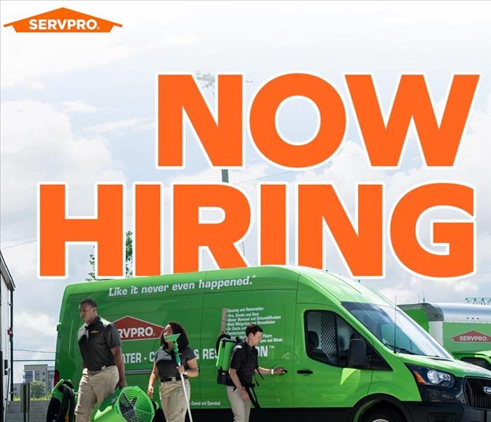 Picture with SERVPRO workers in front of van, with text that say Now Hiring.